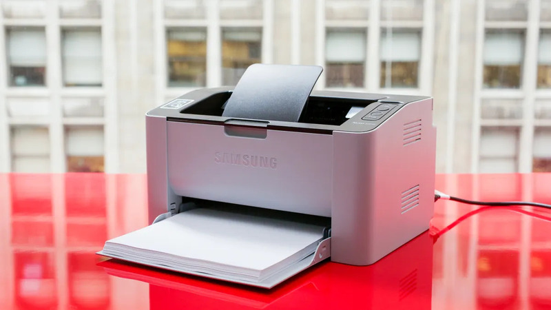 Black Samsung Printer on Red Table